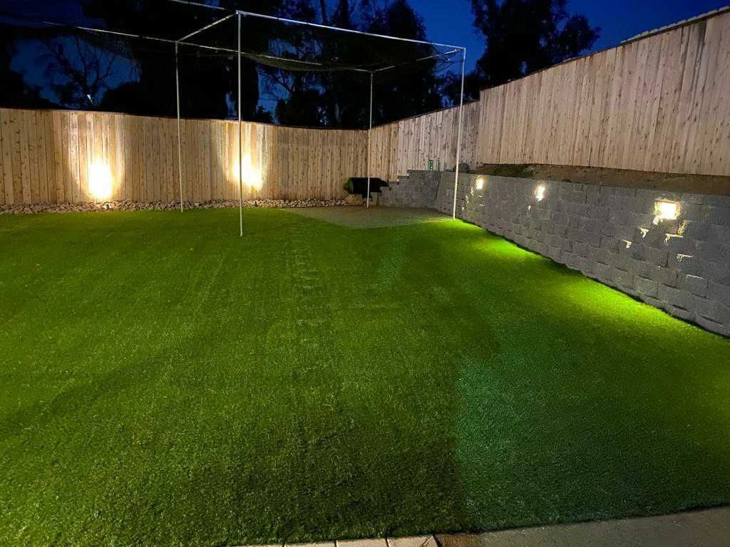 Turf and accent lighting at night